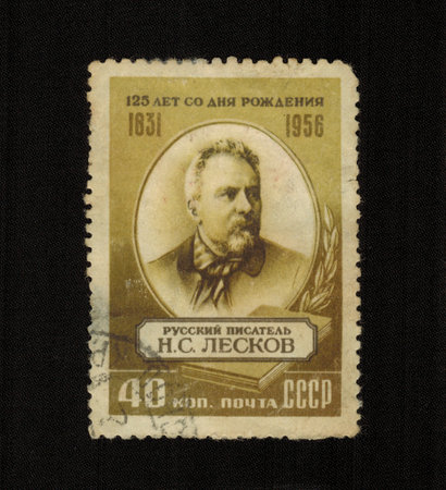 USSR - CIRCA 1956: A stamp printed in USSR shows Nikolai Leskov Russian publicist, writerのeditorial素材