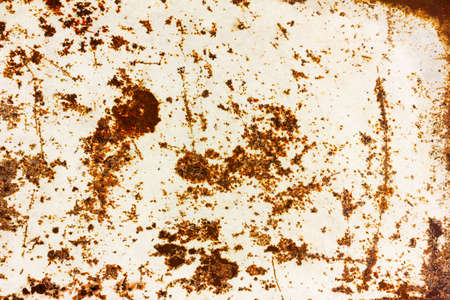 grunge background texture of painted white iron with rust spotsの写真素材