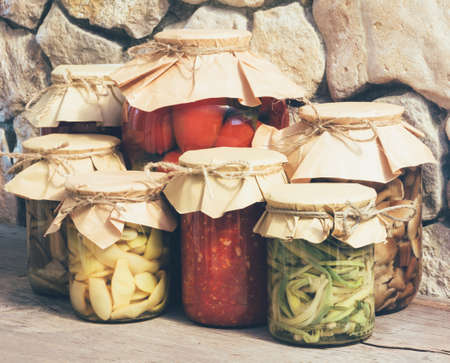 homemade rustic vegetable canned food, close-up, tinting photosの写真素材