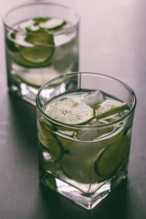 Brazilian cocktail caipirinha, Cachaca, sugar and lime, tinted photoの写真素材