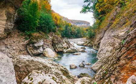 landscape the rocky bed of a mountain river in autumnの写真素材