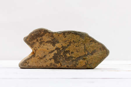 natural stone shaped arrow pointer on white background mock up for text, phrases, letteringの写真素材