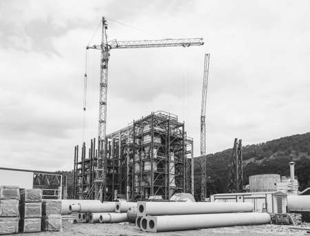 industrial landscape construction site of the gypsum processing plant, black and white photoの写真素材