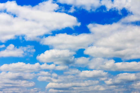 beautiful cloudy landscape on a blue skyの写真素材