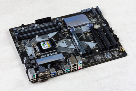 Maykop, Russia - November 9, 2018: Motherboard asus on a gray background closeup