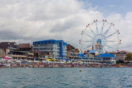 Sochi, Russia - August 23, 2018: city beach Lazarevskoye with vacationers summer dayのeditorial素材