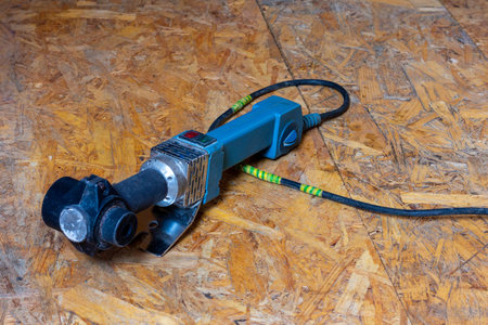 soldering iron for polypropylene pipes on the floor close up
