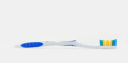 toothbrush close-up on a white background, side view