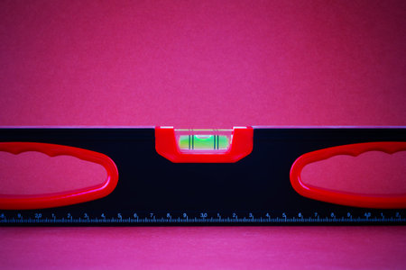 construction level close-up on a purple background