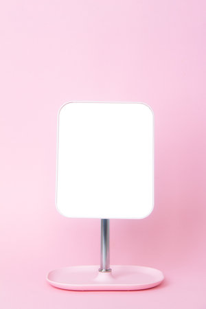 mirror on a pink background close-upの写真素材