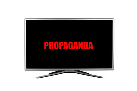 the inscription propaganda in the red color on a black TV screen isolated on a white backgroundの写真素材