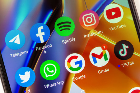Adygea, Russia - August 11, 2023: telegram, facebook, spotify, instagram, youtube, twitter, whatsapp, google, gmail, tik tok mobile app icons on xiaomi poco smartphone screen closeupのeditorial素材