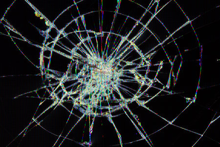 traces of bumps and cracks on a broken LCD screen, computer monitor or TV screenの写真素材