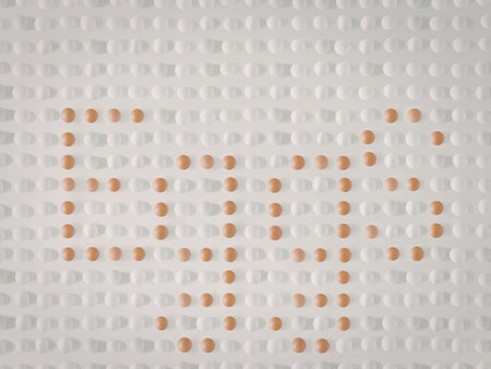 A close-up image of a white grid background with orange dots arranged in a specific pattern.