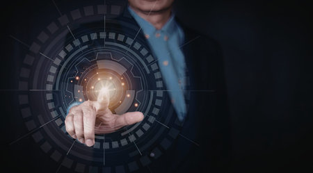 A close-up image of a businessman in a suit interacting with a digital globe. The globe is...