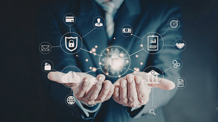 A person's hands are shown interacting with a digital interface displaying various network and...