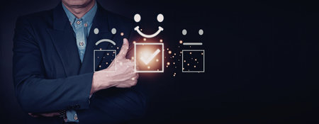 A businessman in a suit is interacting with digital feedback icons, including smiley faces and...