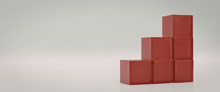 An image featuring a stack of red cubes arranged in a pyramid-like structure on a reflective...