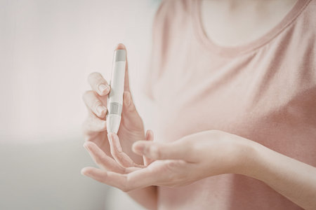 A close-up image of a person holding an object in their hand, emphasizing personal care.