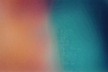 A colorful gradient background featuring a blend of orange, pink, blue, and green hues, creating a visually appealing and soft effect.の写真素材