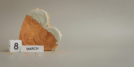 A heart shaped cake with green frostingの写真素材