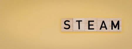The image features the word STEAM on wooden tiles against a bright yellow background.