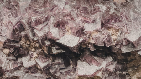 This image presents a detailed view of amethyst geode crystals, showcasing their unique purple crystalline structure.の写真素材