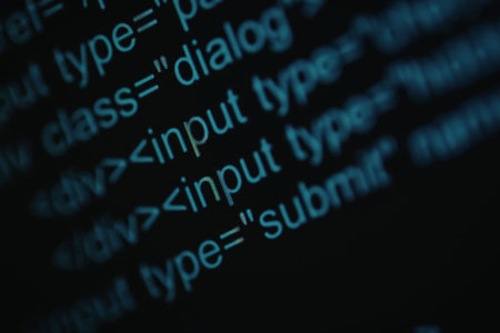 A close-up view of code on a screen, focusing on input types and submit buttons.
