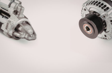 Automotive alternator and starter motor are displayed on a white background highlighting their...