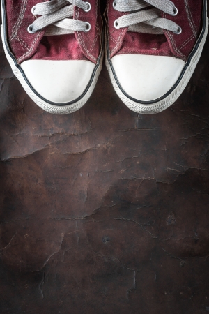 old red Sneakers on old Leatherの写真素材