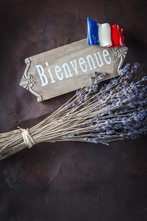 Welcome to France - wooden Sign on old Leather with Lavenderの写真素材