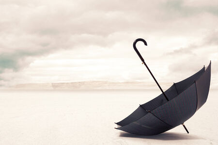 classic Umbrella in a Desertの写真素材