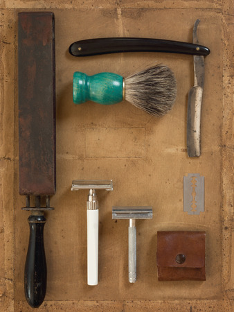 Flat Lay of Shaving Equipment on vintage Backdropの写真素材