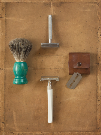 Flat Lay of Shaving Equipment on vintage Backdropの写真素材
