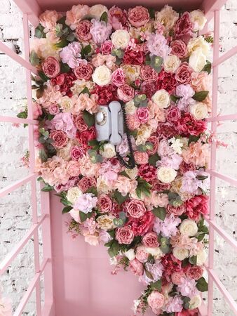 pink telephone box in colorsの写真素材