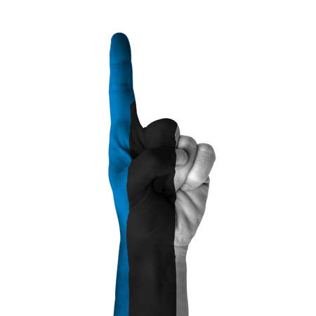 Hand pointing thumb up direction, estonia painted with flag as symbol of up direction, first and number one symbol - isolated on white backgroundの写真素材