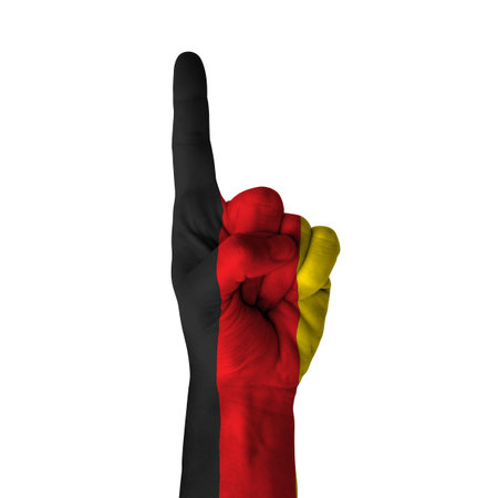 Hand pointing up direction,Germany painted with flag as symbol of up direction, first and number one symbol - isolated on white backgroundの写真素材