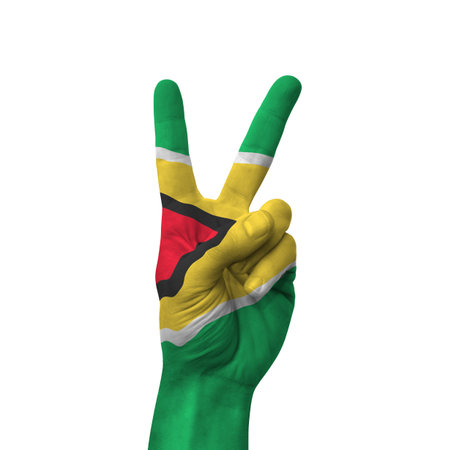 Hand making victory sign, guyana painted with flag as symbol of victory, win, success - isolated on white backgroundの写真素材