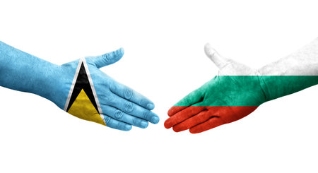 Handshake between Bulgaria and Saint Lucia flags painted on hands, isolated transparent image.の写真素材