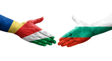 Handshake between Bulgaria and Seychelles flags painted on hands, isolated transparent image.の写真素材