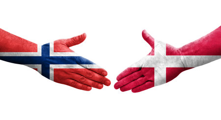 Handshake between Denmark and Norway flags painted on hands, isolated transparent image.の写真素材
