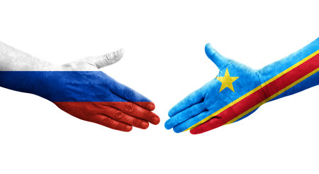 Handshake between Dr Congo and Russia flags painted on hands, isolated transparent image.の写真素材