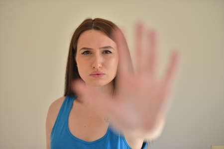 A girl is saying STOP!の写真素材