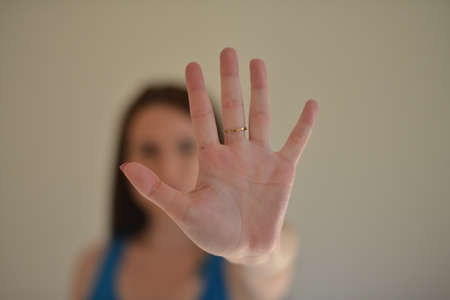 A girl is saying STOP!の写真素材
