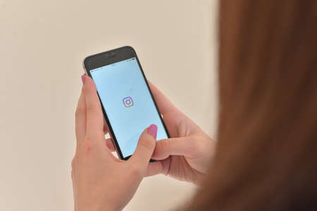 Girl is entering her Instagram accountのeditorial素材