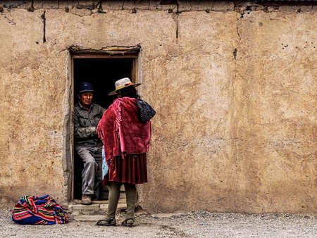 Salesmen offering merchandise door to doorの写真素材