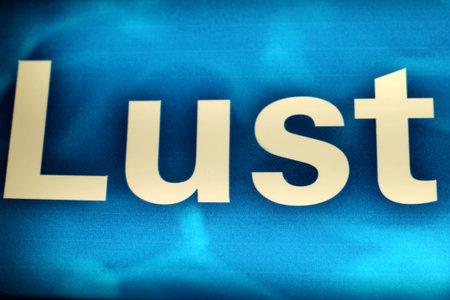 Lust - on a blue surface