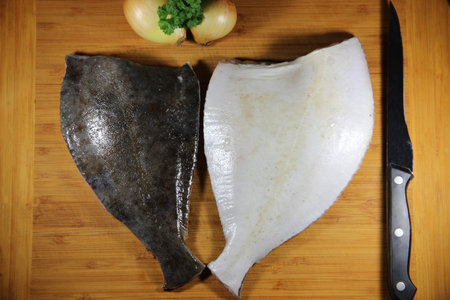 Fish on wooden plate