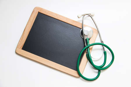Stethoscope and table to inscribeの写真素材
