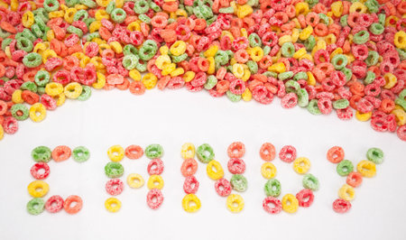Group of fruit cereal  Candy word written with cereals 